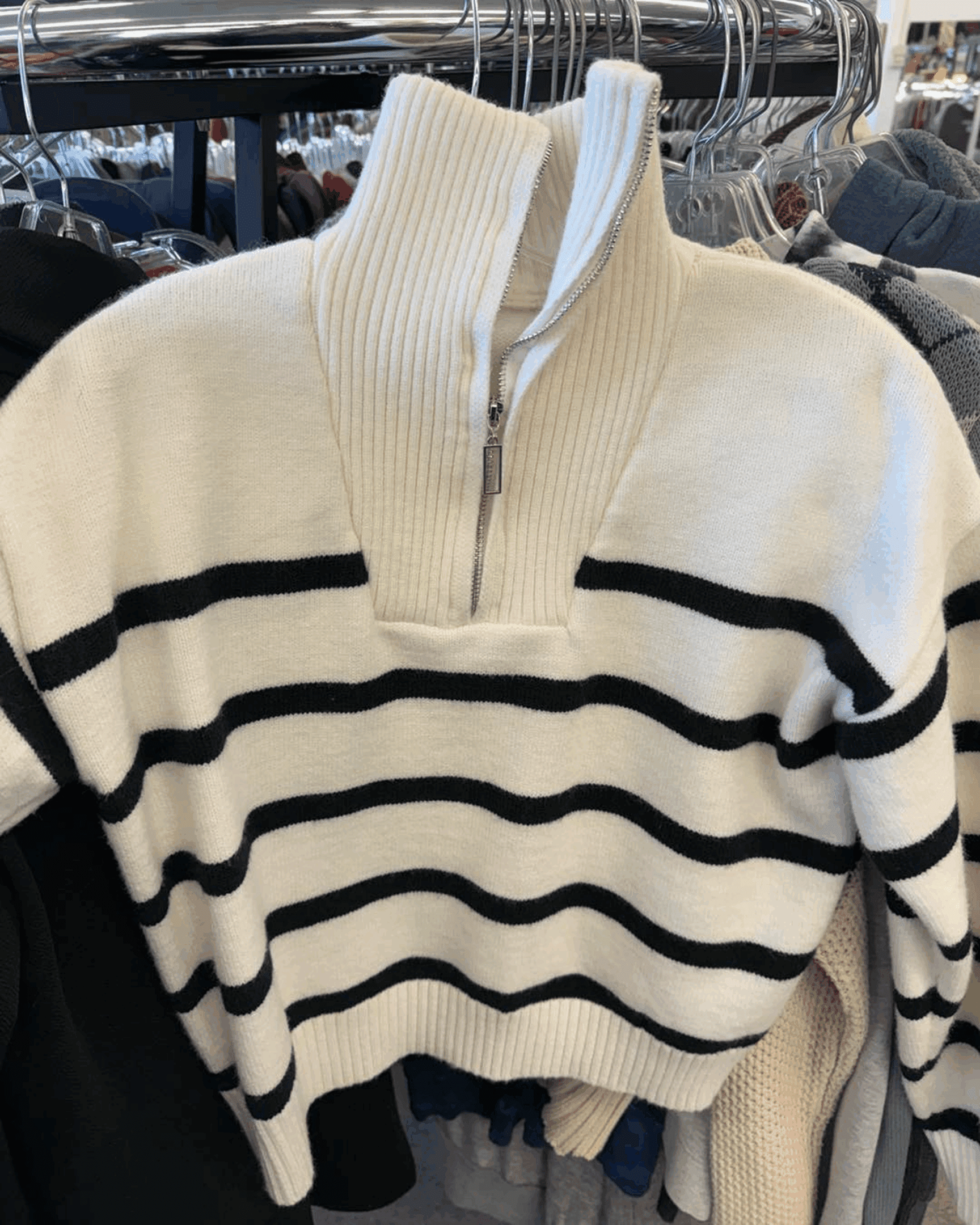 Sweater with zipper and stripes